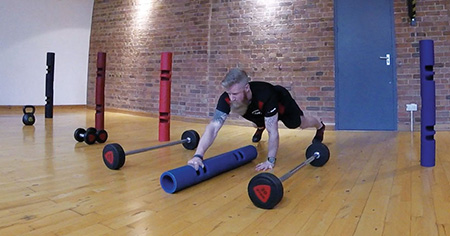 Master Trainer Aaron Barnett working out using ViPR