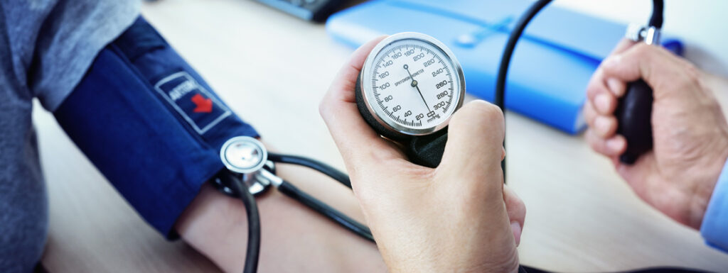 A person getting their blood pressure checked