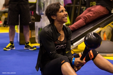 Dame Kelly Holmes is all smiles on Physical Company's stand 