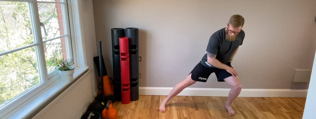 A man levelling up his lunges at home