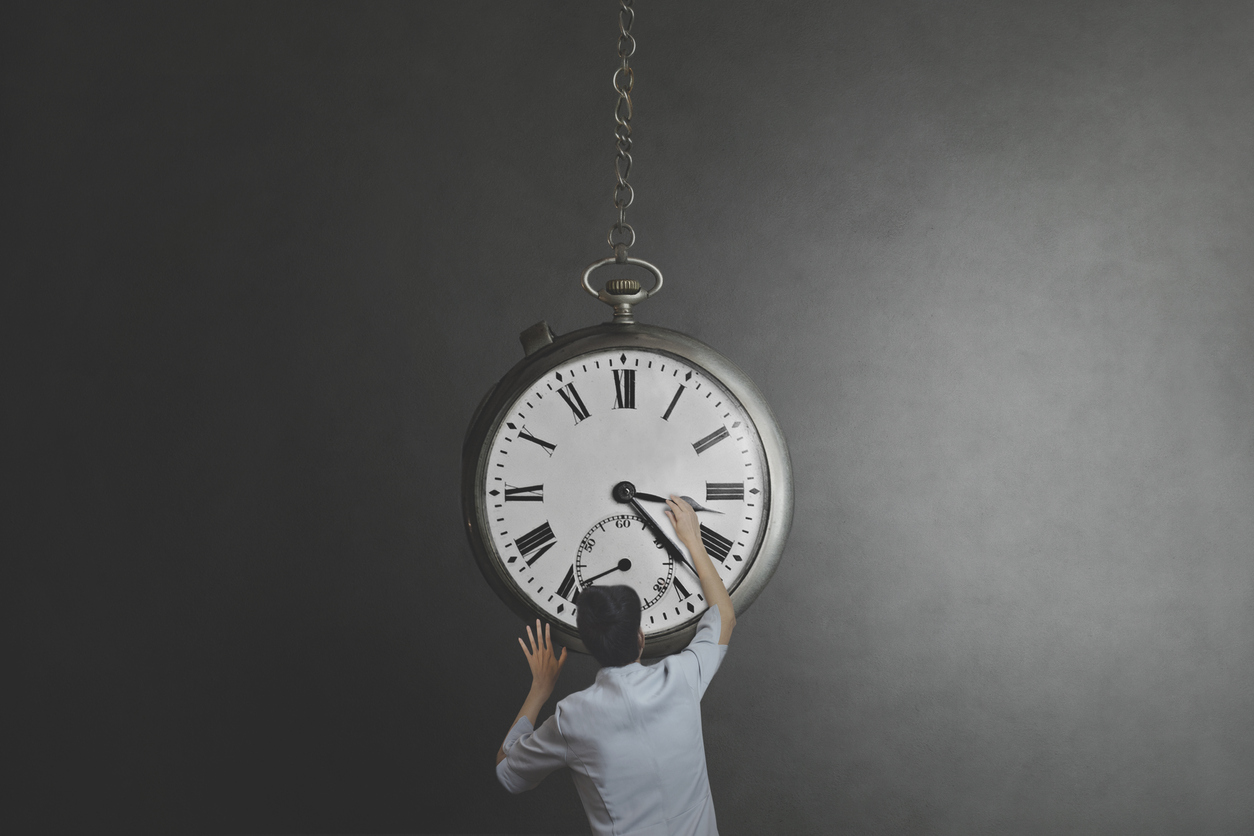 What's the best time? Image of woman trying to control time