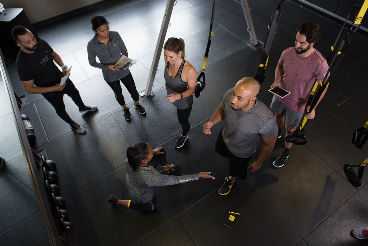 TRX Update - Image of a TRX education taking place in a studio