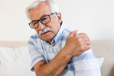 Pain-free mindset - Image of older man in pain