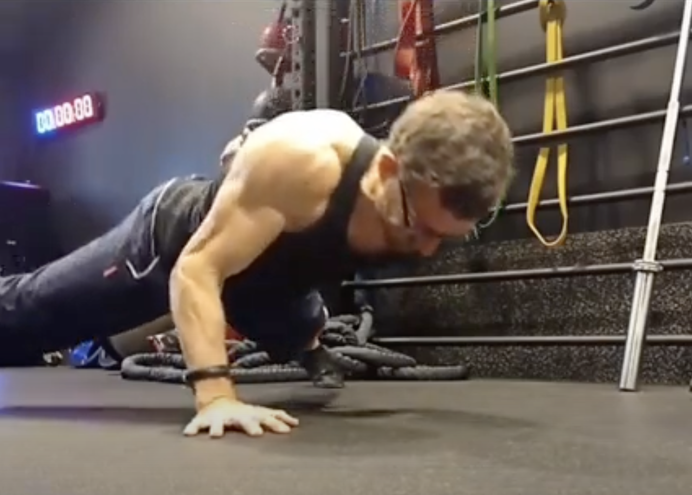 Fitness career - Image of Olly Jeffrey doing a one handed press-up