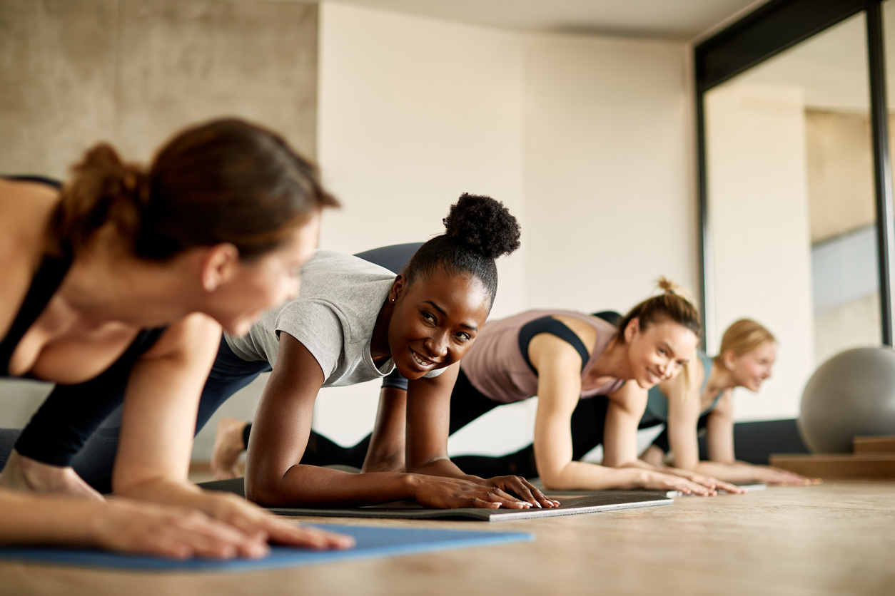 group x - image of group of people taking part in a group exercise session