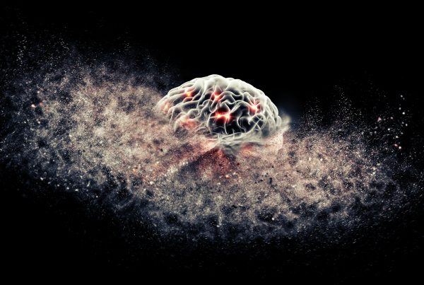 Dementia depicted by an illustration of a brain appearing to disappear.