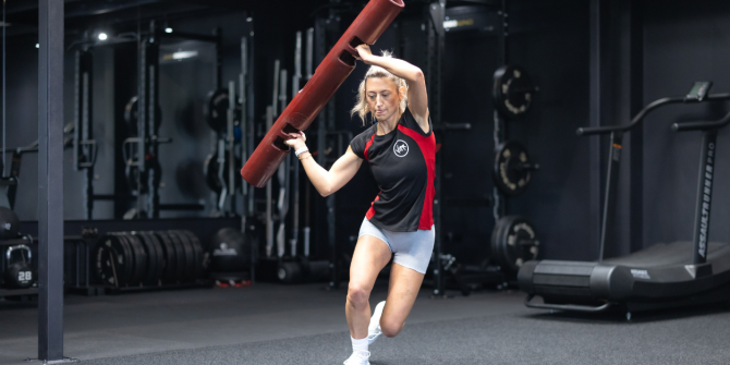 Image of Strong woman workout using ViPR