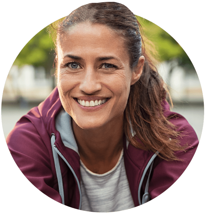Smiling woman dressed in sports gear